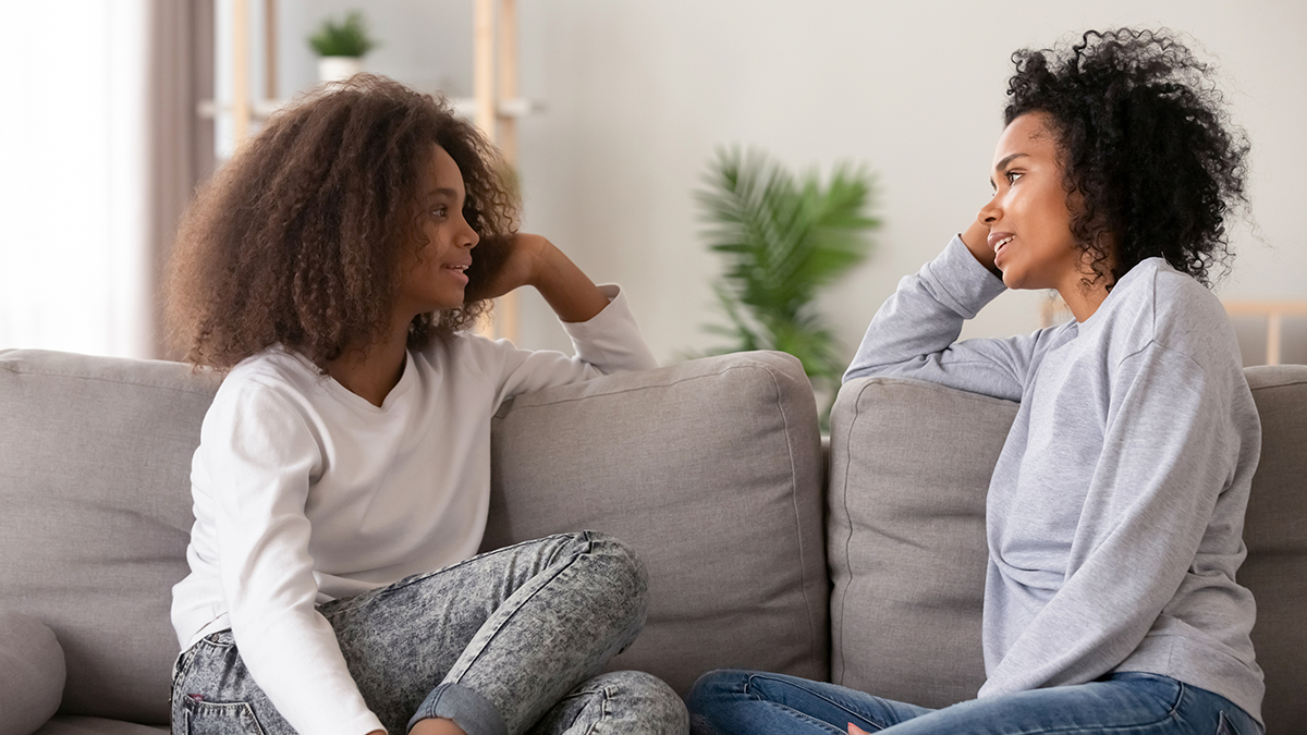 Women Talking a mother and daughter in a serious conversation