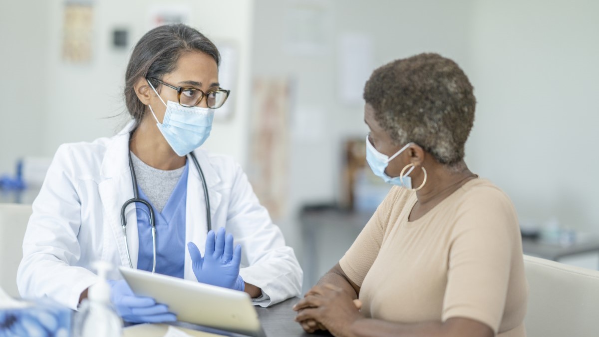 Woman Doctor a woman talking to her doctor