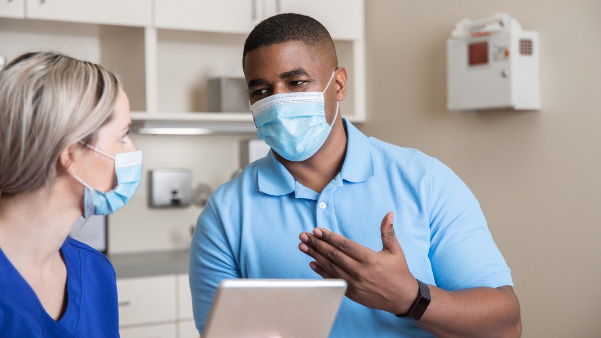 Ask Doctor A man asking his doctor a question