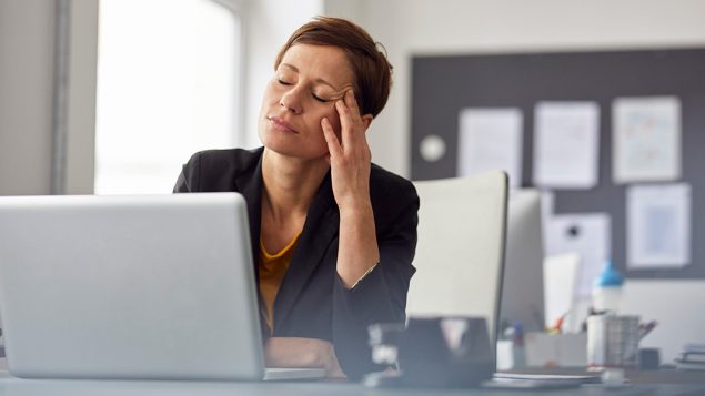 Woman sitting at desk.