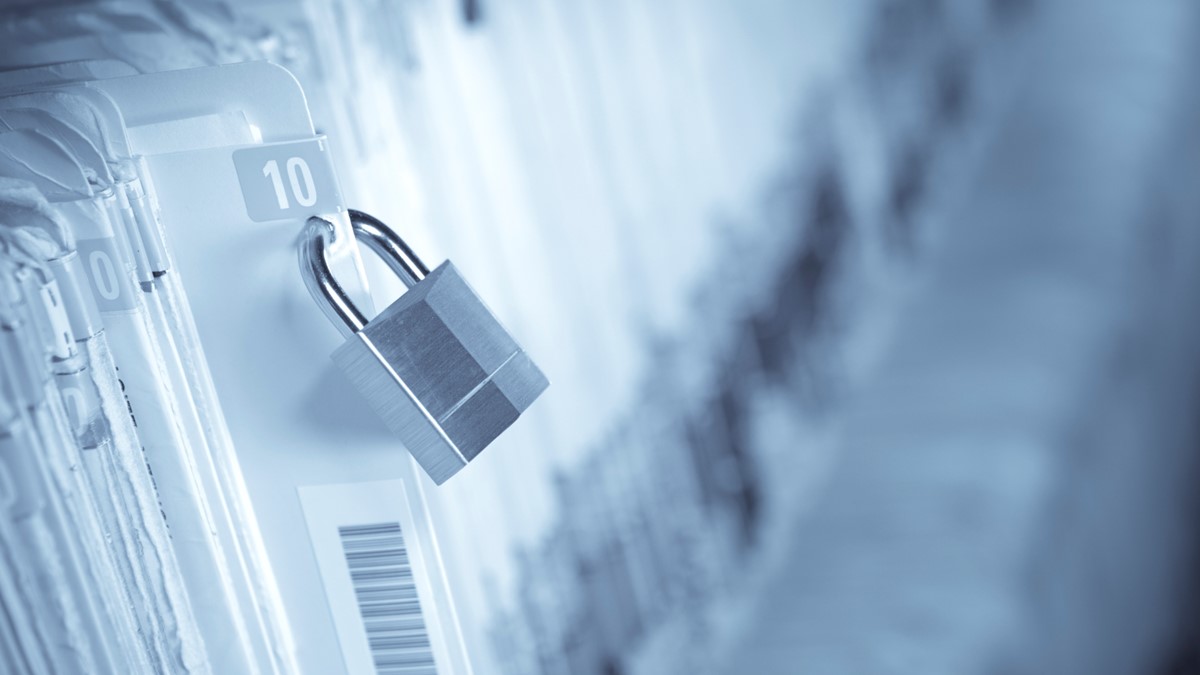 Locked personal reporting files on a shelf.