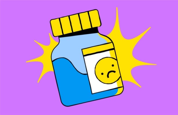 A vial with a frown face on it's label