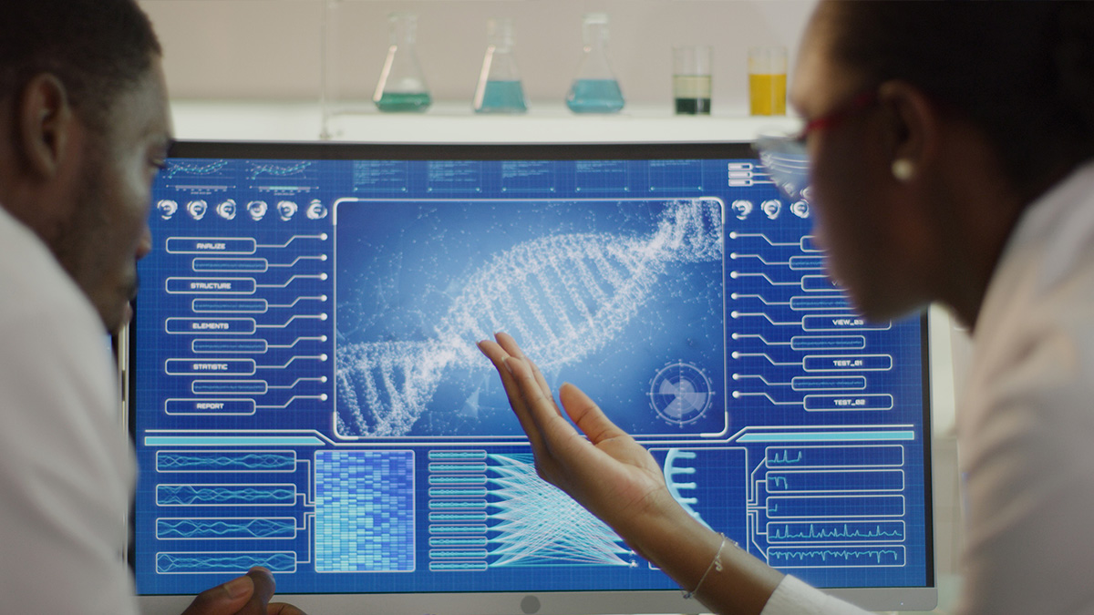 Genetic Testing two public health professionals are looking at a double helix