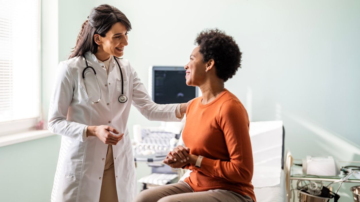 Primary Care 2 Healthcare provider talking to patient