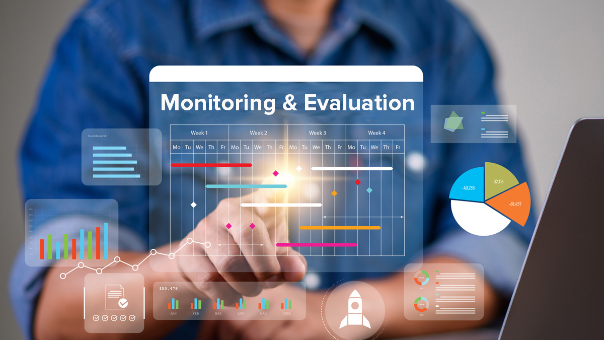 Monitoring and Evaluation Image This image shows various charts and graphs and the words Monitoring & Evaluation.