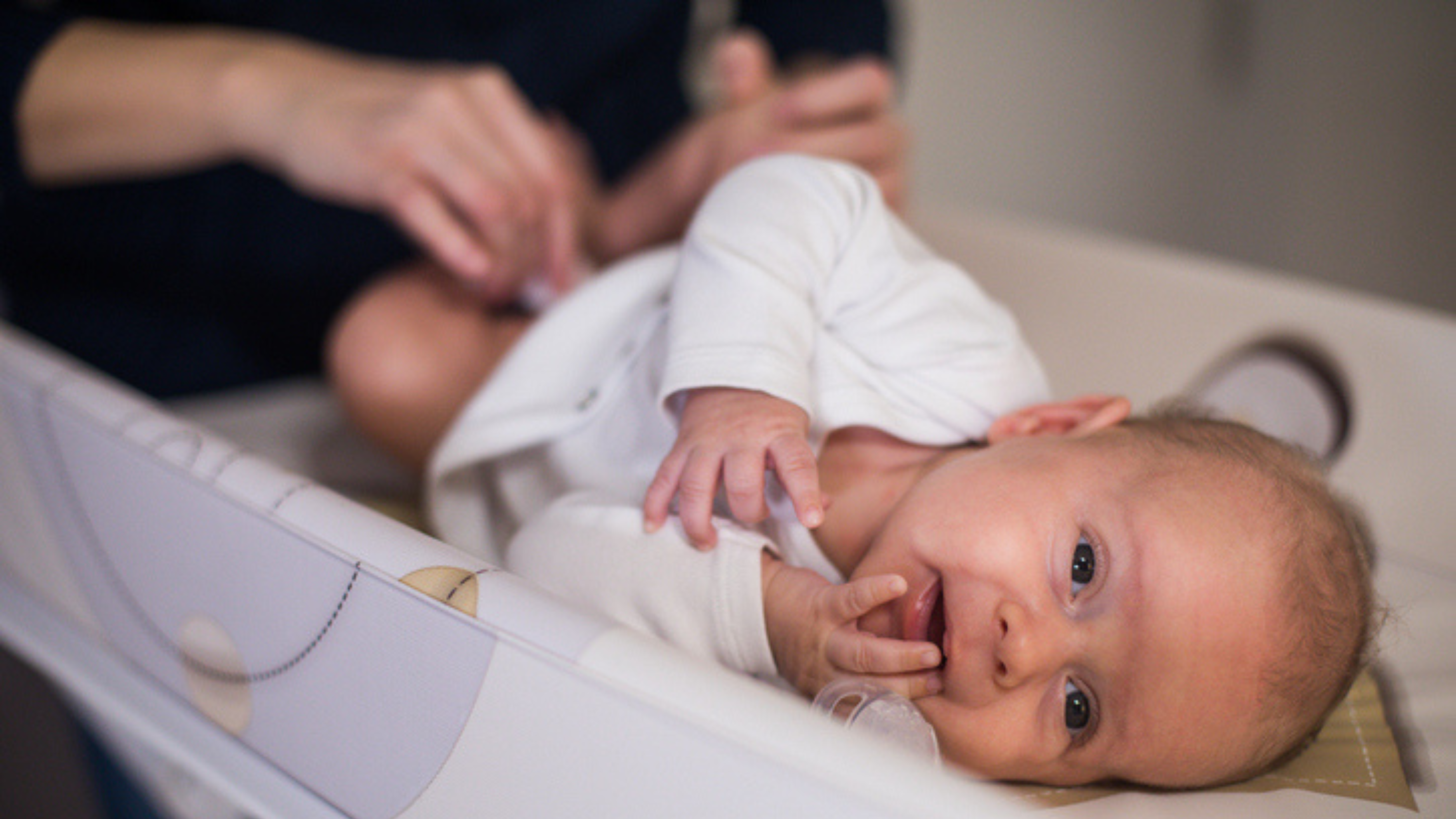 Baby getting diaper changed