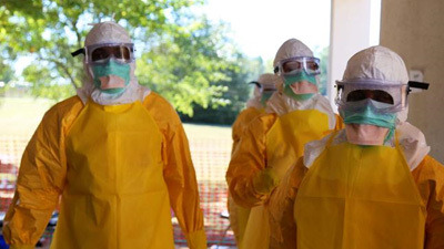 DHCPP Three health workers in personal protective equipment