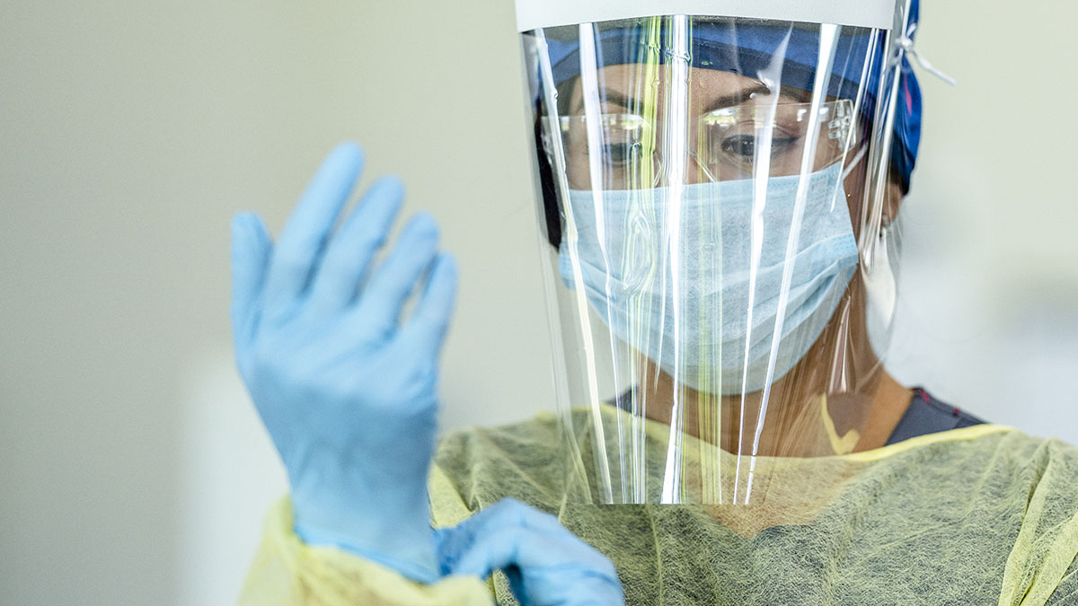 Close up of a female doctor wearing personal protective equipment (PPE).