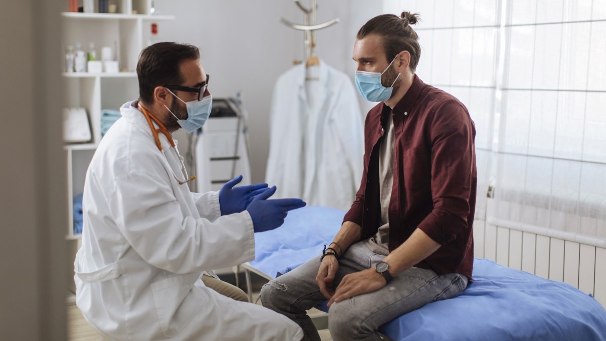 a man talking to his doctor
