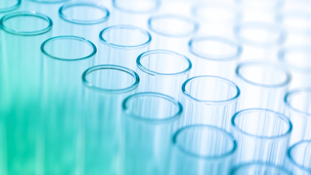 A collection of glass vials in a laboratory.