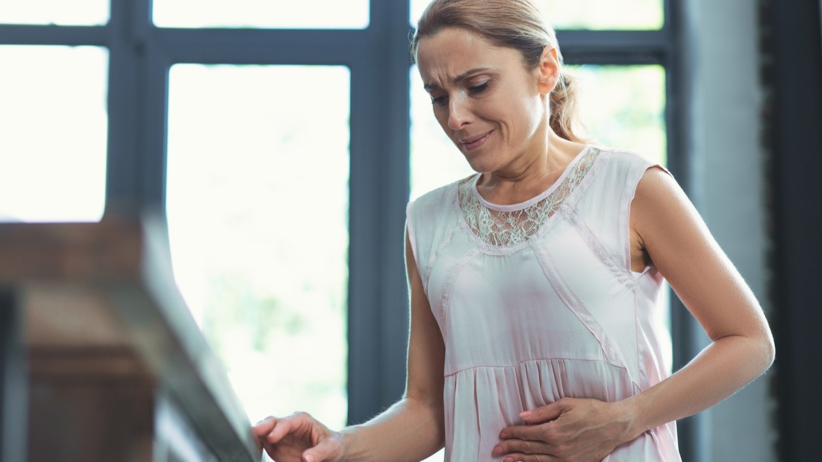 Woman Pain a woman with abdominal pain